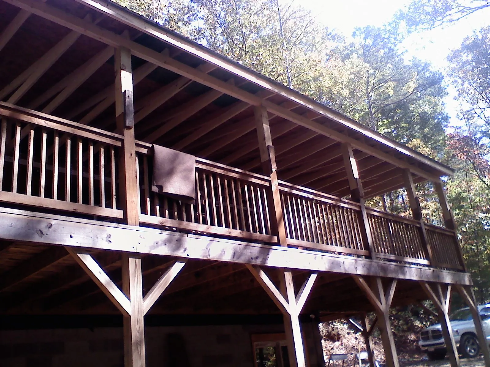 Timber framing under a new elevated porch and deck — Roof Leak Repair in Mulino by Roofing Brothers